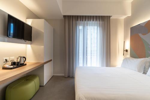 Hotel Estenseにあるベッド