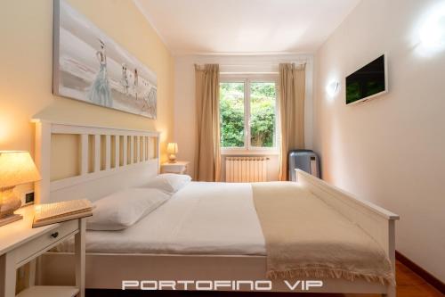 Postel nebo postele na pokoji v ubytování Attico by PortofinoVip