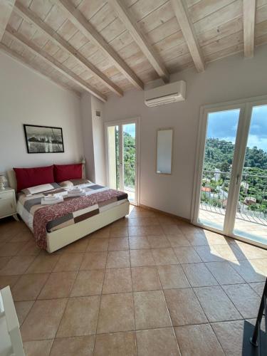 Ένα ή περισσότερα κρεβάτια σε δωμάτιο στο Villa Olivia Residence by PortofinoVacanze
