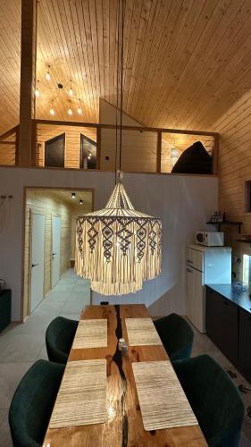 a large chandelier hanging from a ceiling in a kitchen at Zillya Club in Tatariv