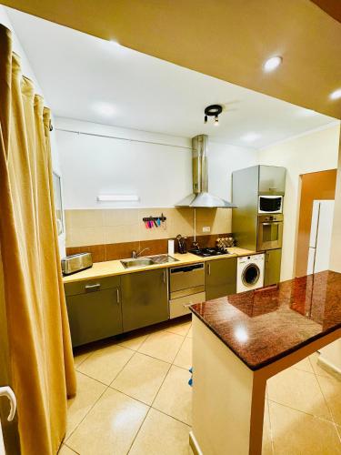 Kuchyň nebo kuchyňský kout v ubytování Vacances à Mostaganem PLAGE