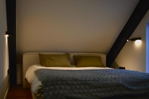 Postel nebo postele na pokoji v ubytování Барнхаус - ваш будинок мрії