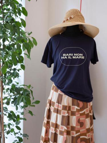 a person wearing a black shirt and a skirt at Imago Plus Hotel in Bari