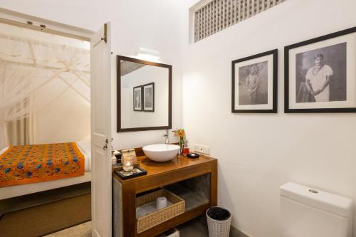 Katil atau katil-katil dalam bilik di Taru Villas Mawella - Tangalle
