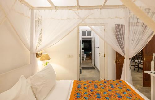 Katil atau katil-katil dalam bilik di Taru Villas Mawella - Tangalle