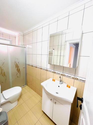 Koupelna v ubytování Gür Apartment