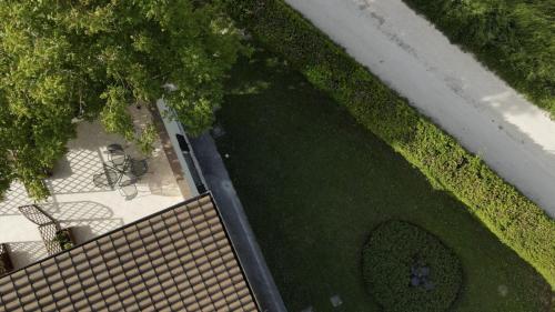 an overhead view of a park with a bench and trees at Domus Laetitiae Santa Croce in Gualdo Tadino