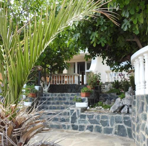 a set of stairs leading to a house at Riviera Beach Hotel in Sozopol
