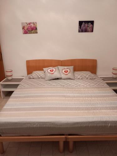 Postel nebo postele na pokoji v ubytování Al Porto low cost
