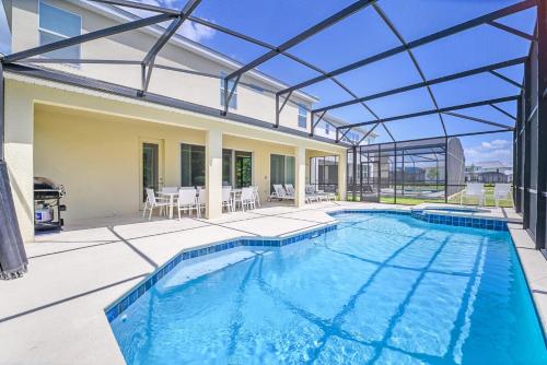 Upstay 9BR Disney Retreat w Pool, BBQ & Hot Tub photo 8