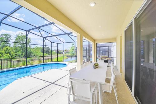 Upstay 9BR Disney Retreat w Pool, BBQ & Hot Tub photo 10