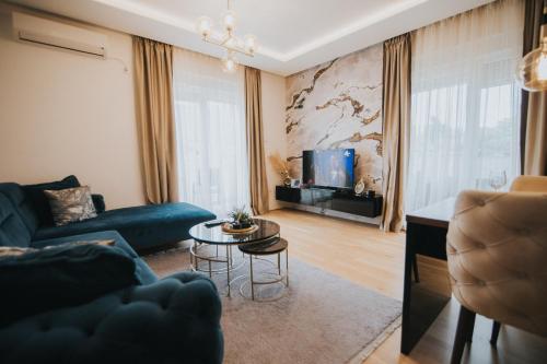 TV in/ali zabaviščno središče v nastanitvi Prestige