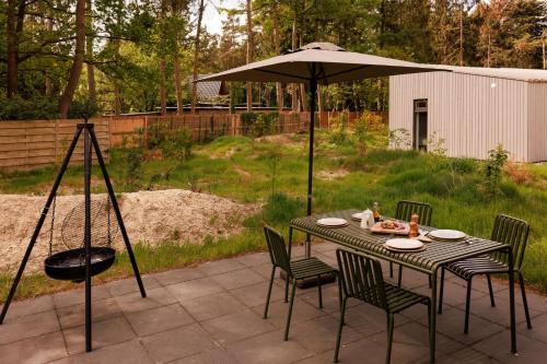 Κήπος έξω από το Dutchen Zeegser Duinen Suitelodges