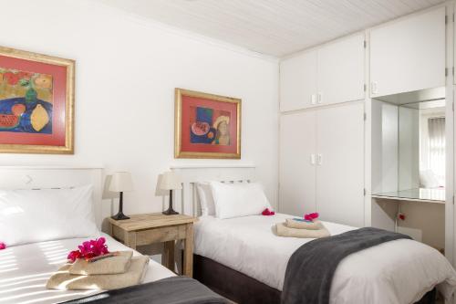 En eller flere senge i et værelse på Estuary Breeze