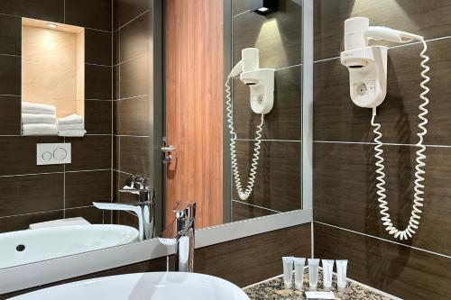 Koupelna v ubytování Hotel Levell