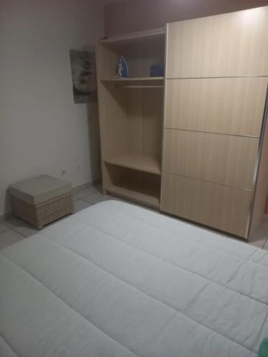 Una cama o camas en una habitación de Appartement confortable avec terrasse à Petit-Canal - 50 m²
