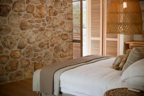 Ένα ή περισσότερα κρεβάτια σε δωμάτιο στο MAISON FRANSCHHOEK