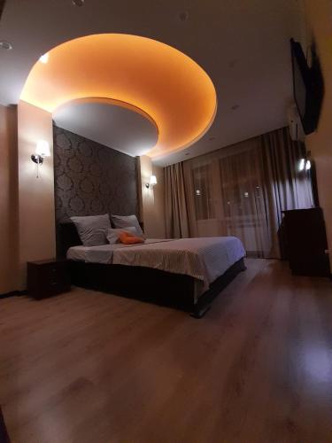 Ένα ή περισσότερα κρεβάτια σε δωμάτιο στο Apartments Новые дома Масельского Хтз