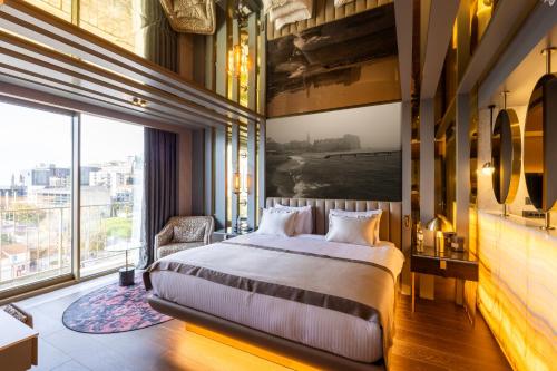 Cama o camas de una habitación en Merit Starlit Hotel & Residences