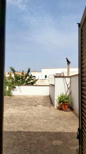 a view of a patio from the outside of a house at DD's -Guest House- in Taviano