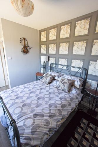 a bedroom with a bed with a large window at 4 Guests - Seaside Cottage - 5min Drive To The Sea in Killorglin