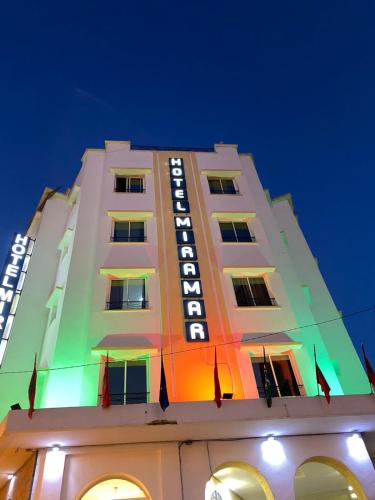 a building with a sign on the side of it at Hotel Miramar in Tangier