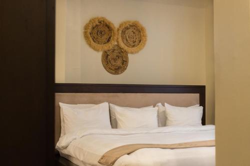 Ένα ή περισσότερα κρεβάτια σε δωμάτιο στο The Getaway Experience Villa
