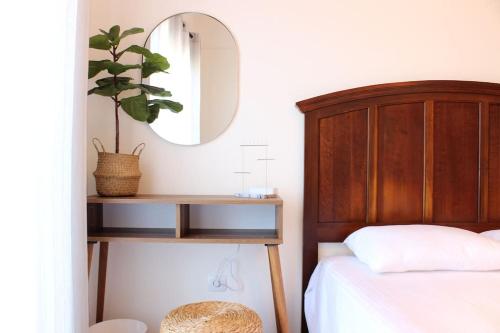 Ένα ή περισσότερα κρεβάτια σε δωμάτιο στο Samos Holiday Home