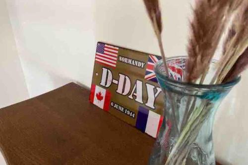 a box of d day sitting on top of a table at Gîte du lavoir in Nonant