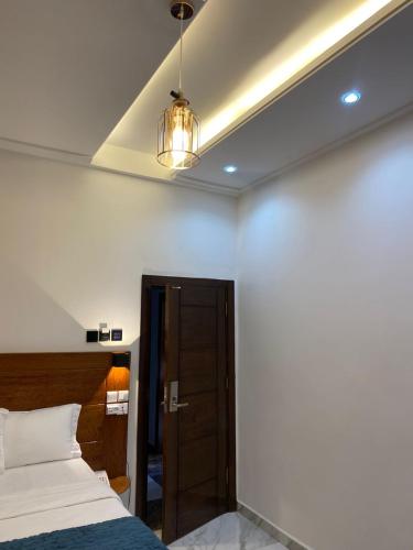 Postel nebo postele na pokoji v ubytování Hôtel TAZ PLUS