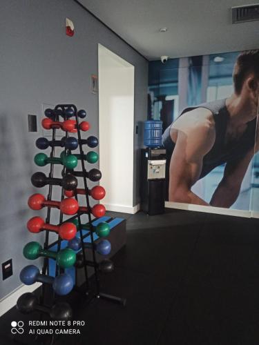 a gym room with a rack of balls at Slaviero1411 in Guarulhos