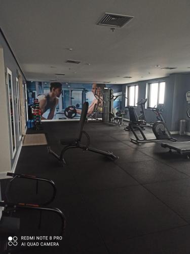 two men working out in a gym with machines at Slaviero1411 in Guarulhos