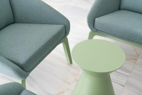a pair of chairs and a stool in a room at Hotel Vista Park in Can Picafort