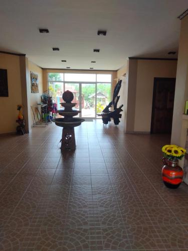 a room with vases on a tiled floor at Changthai Comfort Guest House in Ban Nong Phai