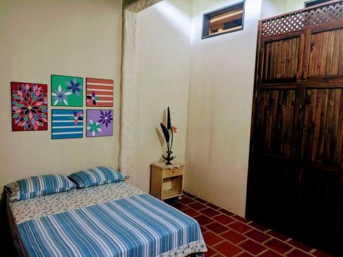 Postel nebo postele na pokoji v ubytování Familiar y hermosa casa de campo