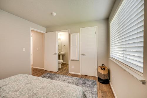 a bedroom with a bed and a window at Updated Yakima Vacation Rental Central Location! in Yakima