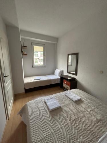 Postel nebo postele na pokoji v ubytování Stefi Apartment