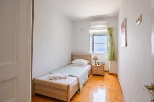 Postel nebo postele na pokoji v ubytování Sofias Retreat Nissaki