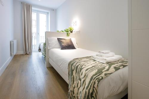 Ліжко або ліжка в номері Apartamento Mandoia by Bilbaohost