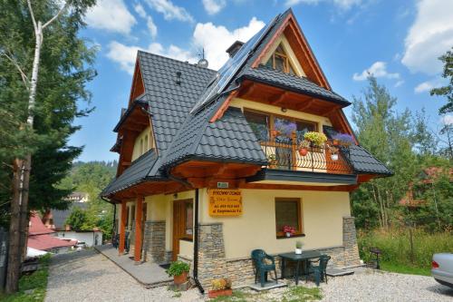 Sykowny Domek - Pokoje Gościnne