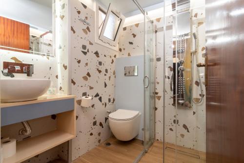 Vonios kambarys apgyvendinimo įstaigoje Niki Rooms