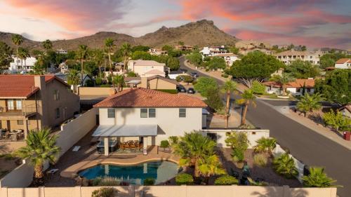 arial view of a house in a residential neighborhood at Game Room Resort Pool HotTub Modern Desert Oasis in Phoenix