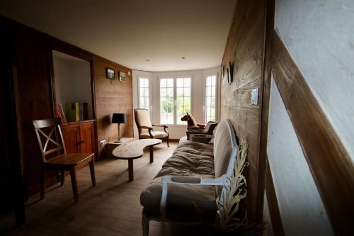 Posezení v ubytování La Villa Mirabelle 2min d'Arromanches-les-Bains