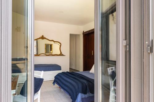 Кровать или кровати в номере Da RESIDENZA AVEZZANO
