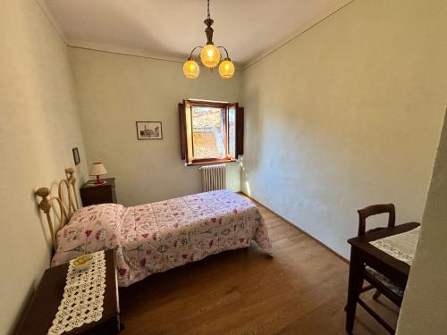 Кровать или кровати в номере Casa Letizia