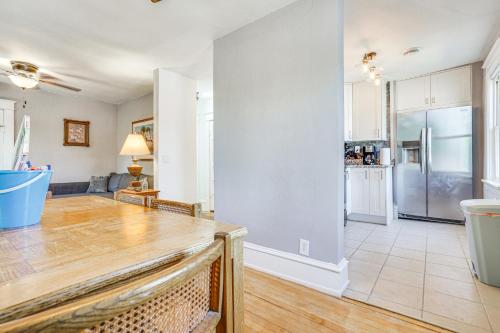 a kitchen and living room with a wooden counter top at Snowmobile Trail On-Site Waterfront Mound Gem! in Mound