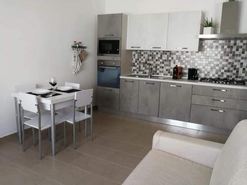 Кухня или мини-кухня в Il Bastione Apartment
