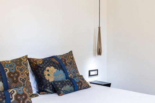 Ένα ή περισσότερα κρεβάτια σε δωμάτιο στο Villa Vi