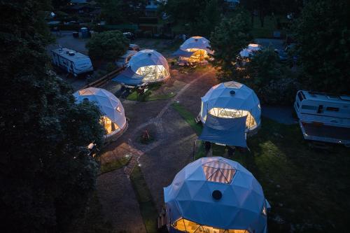 an overhead view of a group of tents in a field at Glamping Slapy in Slapy