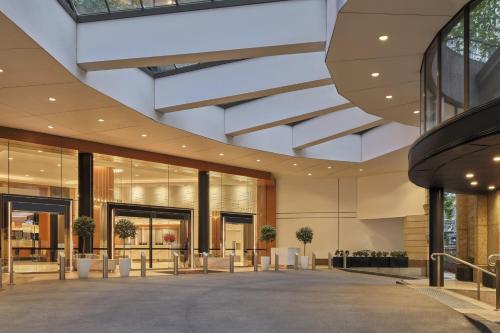 a rendering of the lobby of a building at Sydney Harbour Marriott Hotel at Circular Quay in Sydney